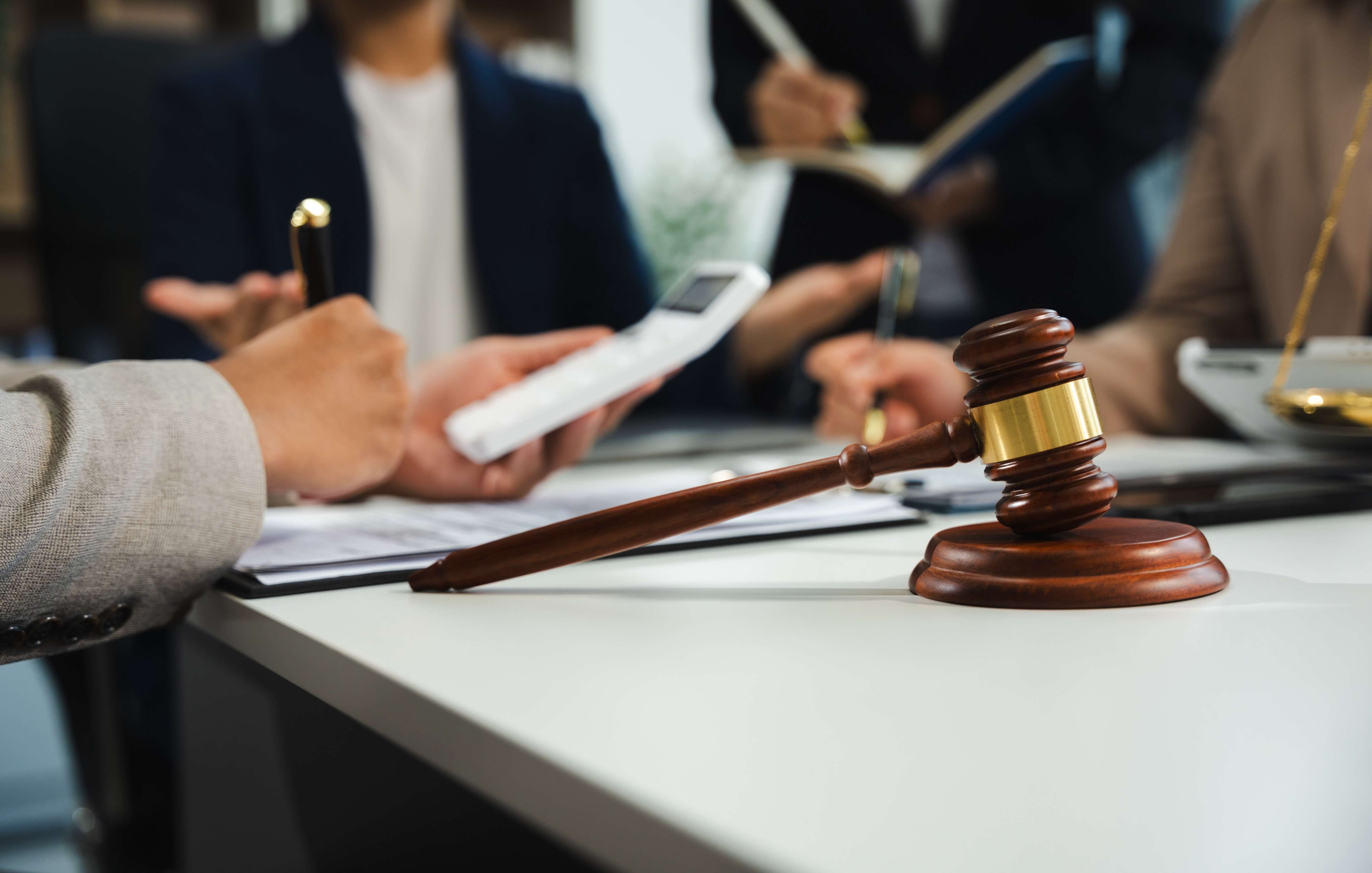lawyerjudgeconsulthavingteammeetingwithclientlawlegalservicesconceptoffice1_g2ndc_4905