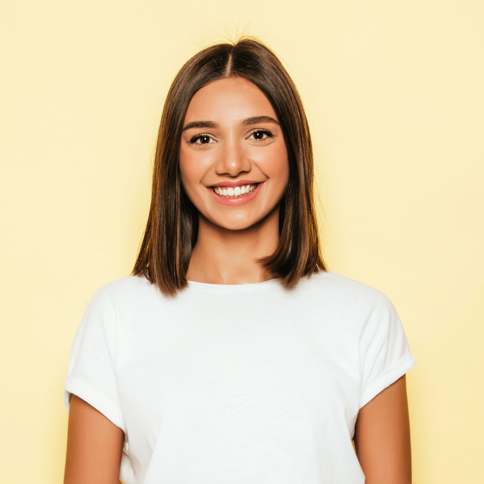 youngbeautifulwomanlookingcameratrendygirlcasualsummerwhitetshirtjeansshortspositivefemaleshowsfacialemotionsfunnymodelisolatedyellow11_gzoti_1620